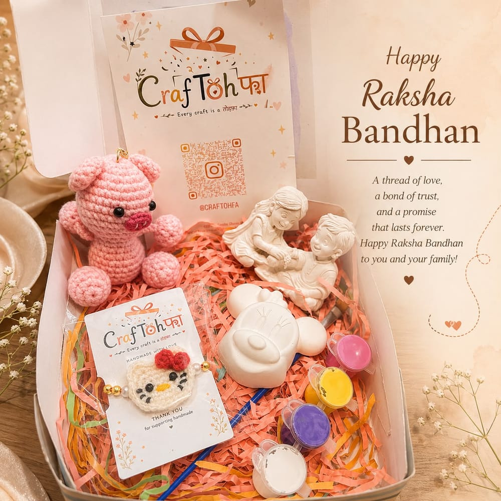Kitty combo box open, showing a pink crochet piggy, a crochet kitty charm, an idol and a kitty face to paint with four paint pots