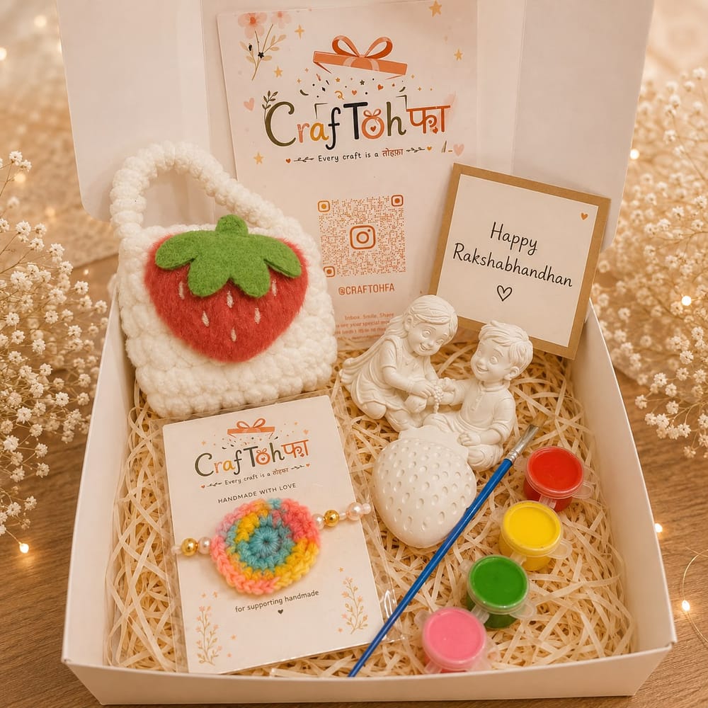 Strawberry pouch combo box with a white crochet pouch, a rainbow crochet charm, an idol and a plaster strawberry with four paint pots